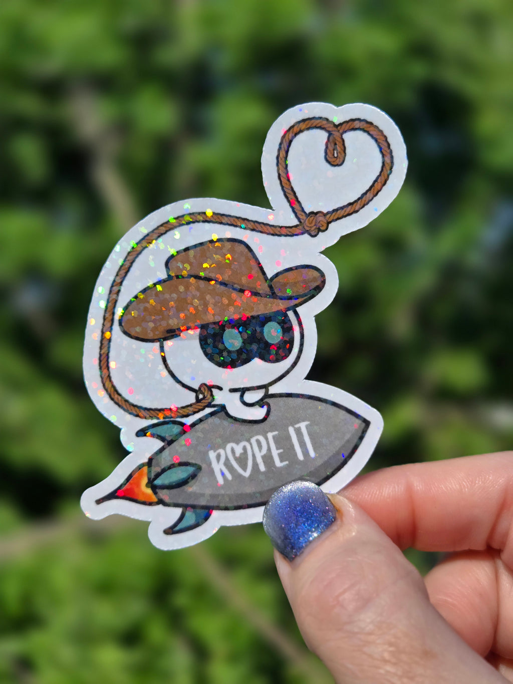 Rope IT!! BTS Jin-inspired sticker featuring Cowboy Wootteo lassoing up some love.