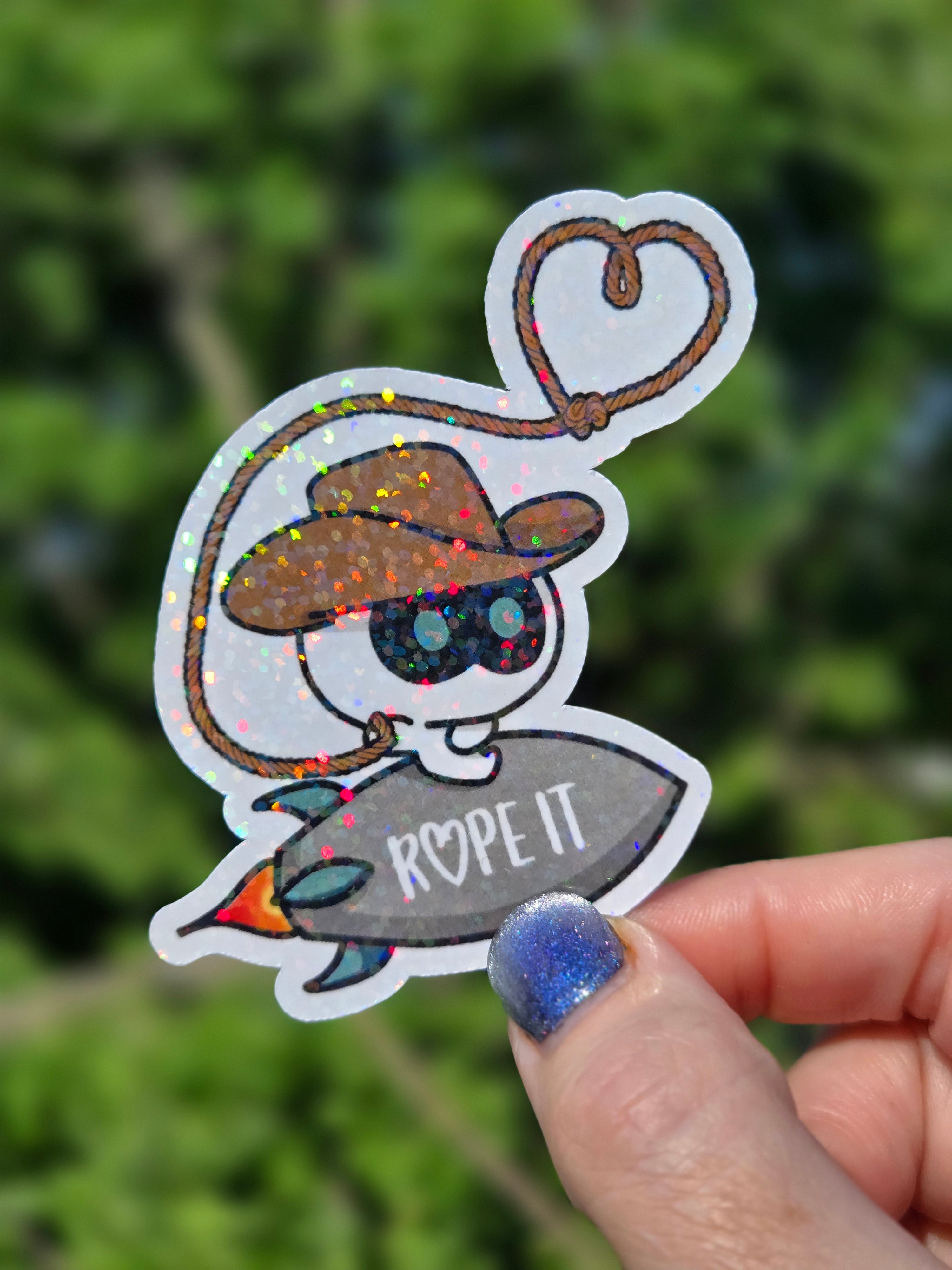 Rope IT!! BTS Jin-inspired sticker featuring Cowboy Wootteo lassoing up some love.
